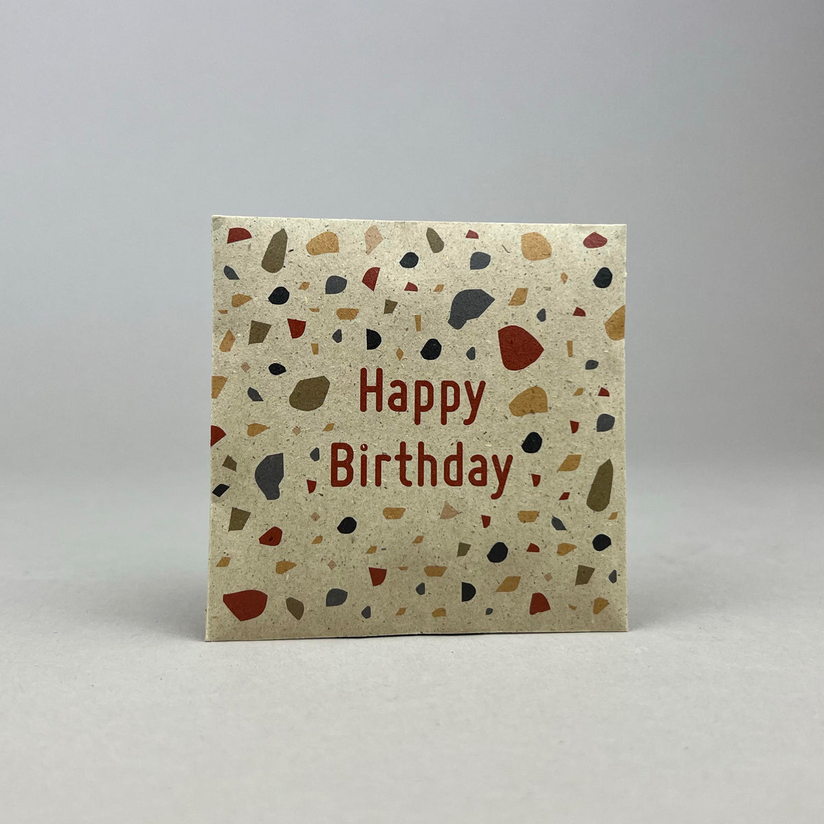 Saattüte mit Blumensaat und Botschaft Happy Birthday mit Terrazzo Motiv