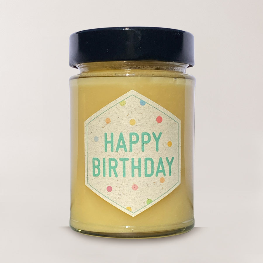 Cremiger Blütenhonig im Glas mit Botschaft Happy Birthday
